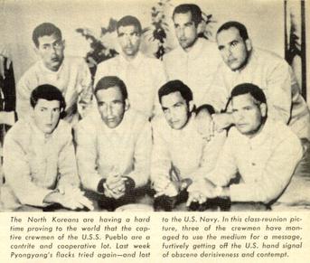 Captives displaying the "Hawaiian Good Luck Sign"