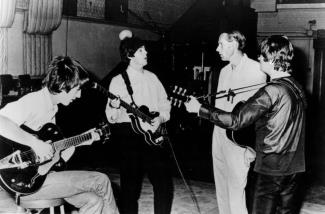 Martin (3rd from left) with the Beatles