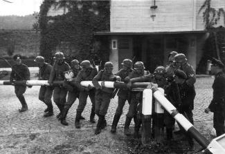 Germans tearing down the border crossing into Poland