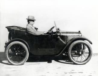 Austin driving an Austin Seven