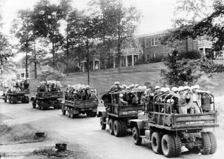 U.S. Army trucks roll across the University of Mississippi campus in the wake of the riots