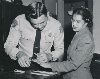 Rosa Parks being fingerprinted